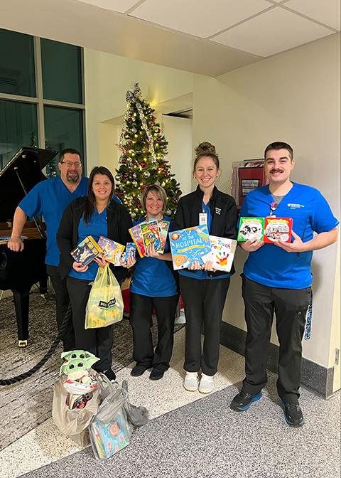 Penn College nursing students, finishing clinical assignments at Janet Weis Children's Hospital, are making the holidays brighter for their young patients.